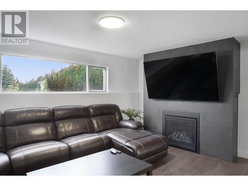 1694 Kingfisher Avenue, Kitimat, BC - Indoor Photo Showing Living Room With Fireplace