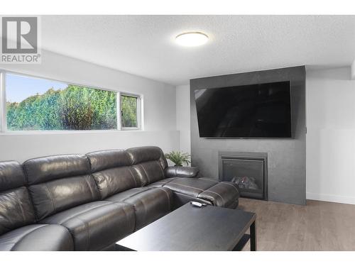 1694 Kingfisher Avenue, Kitimat, BC - Indoor Photo Showing Living Room With Fireplace