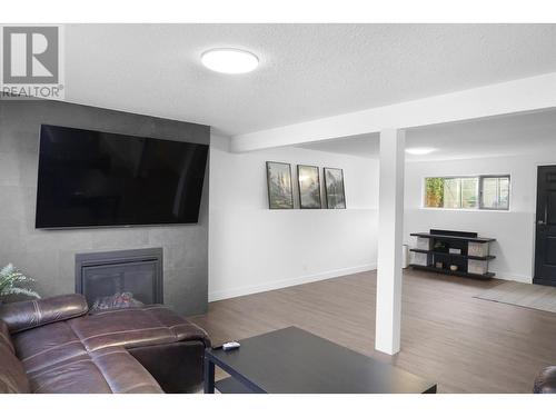 1694 Kingfisher Avenue, Kitimat, BC - Indoor Photo Showing Living Room With Fireplace