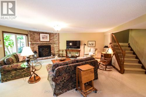 24 - 141 Welland Vale Road, St. Catharines (453 - Grapeview), ON - Indoor Photo Showing Living Room With Fireplace