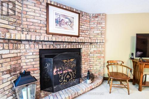 24 - 141 Welland Vale Road, St. Catharines (453 - Grapeview), ON - Indoor Photo Showing Living Room With Fireplace