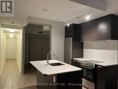 318 - 57 St Joseph Street, Toronto, ON - Indoor Photo Showing Kitchen