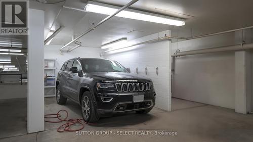 502 - 250 Sydenham Street, London, ON - Indoor Photo Showing Garage