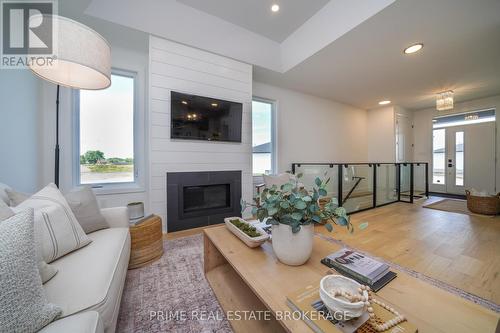 55 - 2 Coastal Crescent, Lambton Shores (Grand Bend), ON - Indoor Photo Showing Living Room With Fireplace