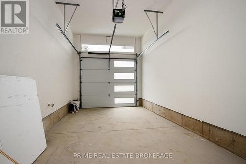 1 - 110 Coastal Crescent, Lambton Shores (Grand Bend), ON - Indoor Photo Showing Garage