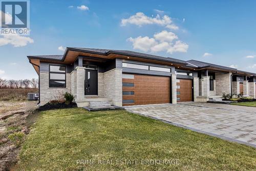 49 - 14 Coastal Crescent, Lambton Shores (Grand Bend), ON - Outdoor With Facade