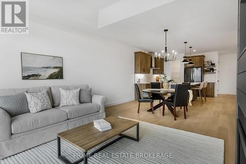 49 - 14 Coastal Crescent, Lambton Shores (Grand Bend), ON - Indoor Photo Showing Living Room