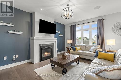 28 Venture Way, Thorold (560 - Rolling Meadows), ON - Indoor Photo Showing Living Room With Fireplace