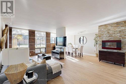 106 - 1540 Pickering Parkway, Pickering, ON - Indoor Photo Showing Living Room With Fireplace