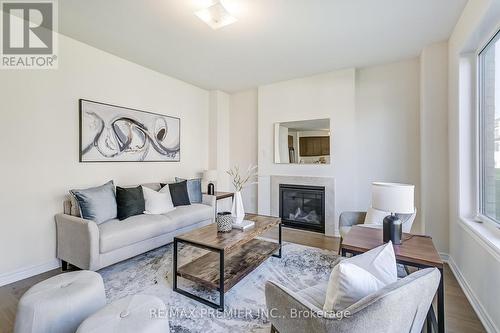 48 Sambro Lane, Whitchurch-Stouffville, ON - Indoor Photo Showing Living Room With Fireplace