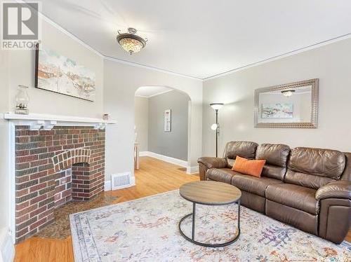 2525 Garnet Street, Regina, SK - Indoor Photo Showing Living Room With Fireplace