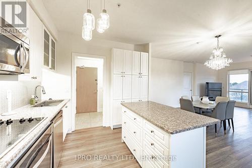 205 - 9088 Yonge Street, Richmond Hill, ON - Indoor Photo Showing Kitchen With Upgraded Kitchen