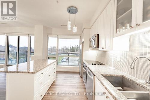 205 - 9088 Yonge Street, Richmond Hill, ON - Indoor Photo Showing Kitchen With Upgraded Kitchen