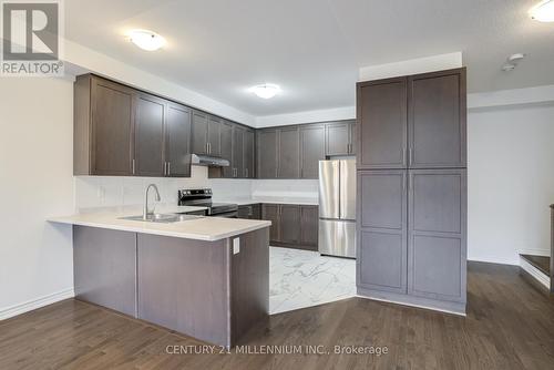 34 Donald Ficht Crescent, Brampton, ON - Indoor Photo Showing Kitchen With Double Sink