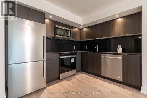 301 - 10 Eva Road, Toronto, ON - Indoor Photo Showing Kitchen