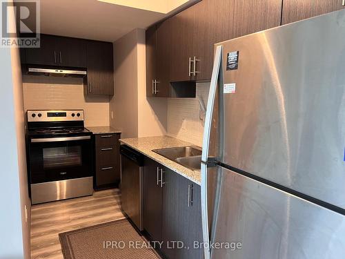 B211 - 275 Larch Street, Waterloo, ON - Indoor Photo Showing Kitchen With Double Sink