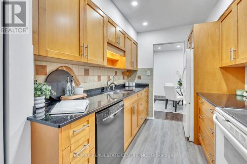 2 - 524 Beechwood Drive E, Waterloo, ON - Indoor Photo Showing Kitchen With Double Sink