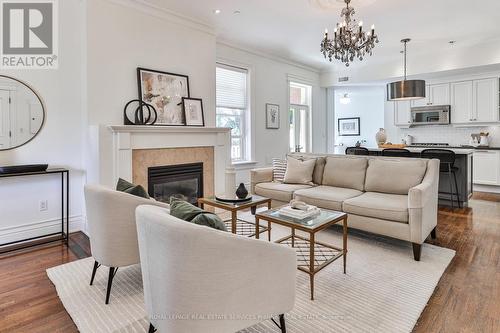 5 - 32 Gothic Avenue, Toronto, ON - Indoor Photo Showing Living Room With Fireplace