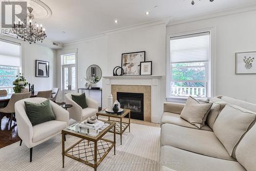 5 - 32 Gothic Avenue, Toronto, ON - Indoor Photo Showing Living Room With Fireplace