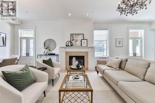 5 - 32 Gothic Avenue, Toronto, ON - Indoor Photo Showing Living Room With Fireplace