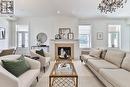 5 - 32 Gothic Avenue, Toronto, ON  - Indoor Photo Showing Living Room With Fireplace 