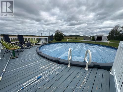 888144 Hwy 65 W, Timiskaming Remote Area, NU - Outdoor With Above Ground Pool With Deck Patio Veranda