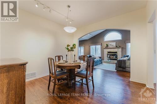 2 Kinmount Private, Ottawa, ON - Indoor Photo Showing Dining Room With Fireplace