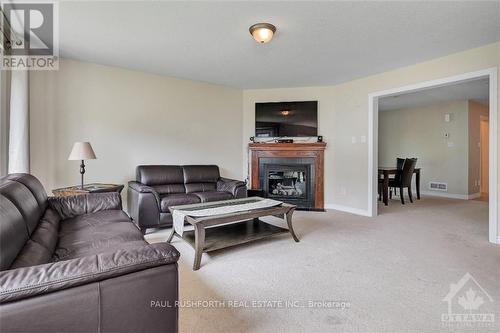 324 River Landing Avenue, Ottawa, ON - Indoor Photo Showing Living Room With Fireplace