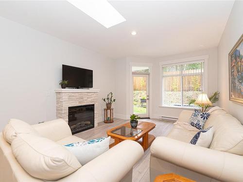 37-300 Grosskleg Way, Lake Cowichan, BC - Indoor Photo Showing Living Room With Fireplace