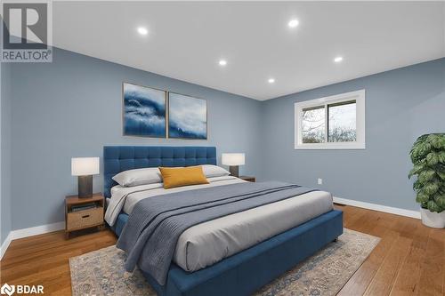 Bedroom featuring wood-type flooring - 3213 Highway 37, Belleville, ON - Indoor Photo Showing Bedroom