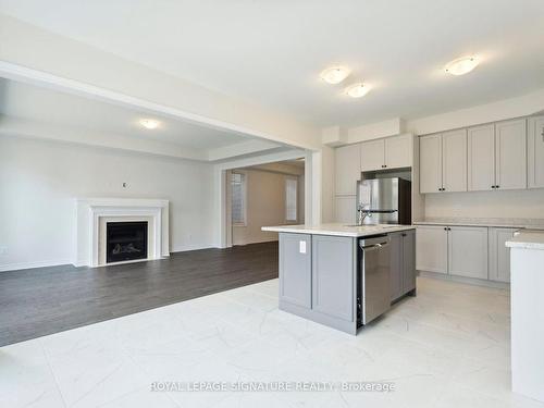 28 Tamworth Terr, Barrie, ON - Indoor Photo Showing Kitchen With Fireplace