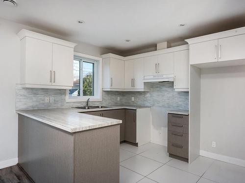 Kitchen - A-8 Rue Du Parc-Notre-Dame, Léry, QC - Indoor Photo Showing Kitchen With Double Sink