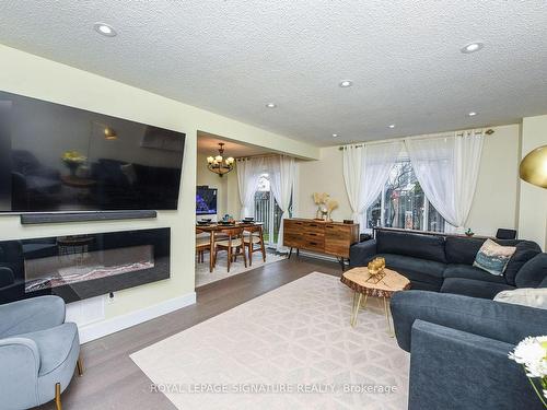 4 Greenleaf Cres, Brampton, ON - Indoor Photo Showing Living Room With Fireplace