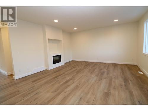 802 4274 22Nd Avenue, Prince George, BC - Indoor Photo Showing Other Room With Fireplace