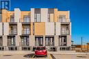 View of building exterior - 142 Foamflower Place Unit# D053, Waterloo, ON  - Outdoor With Facade 