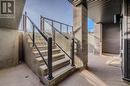 Stairway featuring concrete flooring and a wealth of natural light - 142 Foamflower Place Unit# D053, Waterloo, ON  -  With Exterior 