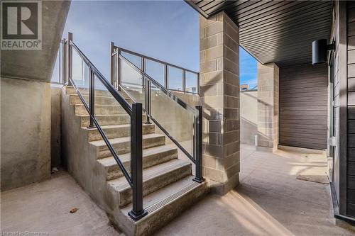 Stairway featuring concrete flooring and a wealth of natural light - 142 Foamflower Place Unit# D053, Waterloo, ON -  With Exterior