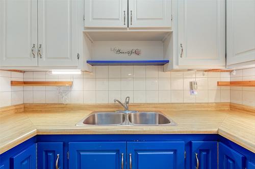 6040 Ellison Avenue, Peachland, BC - Indoor Photo Showing Kitchen With Double Sink