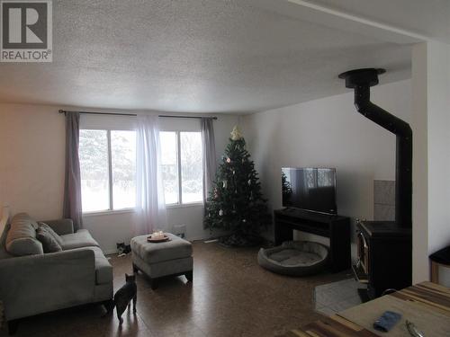 4909 55 Avenue, Pouce Coupe, BC - Indoor Photo Showing Living Room