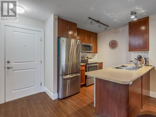 256 Hastings Avenue Unit# 411, Penticton, BC - Indoor Photo Showing Kitchen With Stainless Steel Kitchen With Double Sink