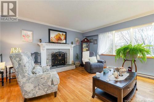 119 Nottingham Drive, Quispamsis, NB - Indoor Photo Showing Living Room With Fireplace