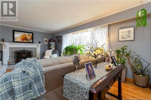 119 Nottingham Drive, Quispamsis, NB - Indoor Photo Showing Living Room With Fireplace