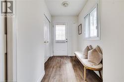 Doorway with wood-type flooring - 