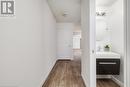 Corridor with sink and light hardwood / wood-style floors - 169 Bismark Drive Unit# 32, Cambridge, ON  - Indoor 