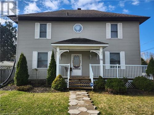 Front facade with a front yard and a porch - 92 First Street, Sturgeon Falls, ON - Outdoor With Deck Patio Veranda