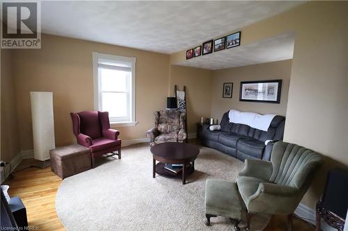 Living room with wood-type flooring - 92 First Street, Sturgeon Falls, ON - Indoor Photo Showing Living Room