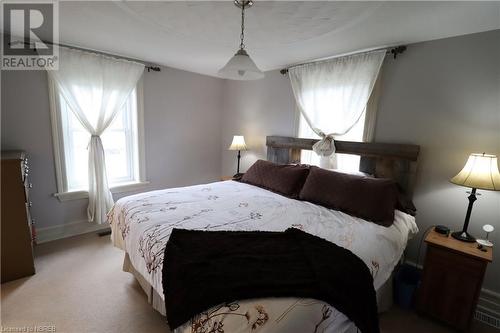 Bedroom featuring light carpet - 92 First Street, Sturgeon Falls, ON - Indoor Photo Showing Bedroom