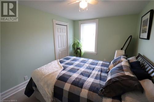 Carpeted bedroom featuring ceiling fan and a closet - 92 First Street, Sturgeon Falls, ON - Indoor Photo Showing Bedroom