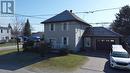 View of property exterior featuring a garage - 92 First Street, Sturgeon Falls, ON  - Outdoor With Facade 