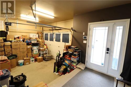 Garage featuring a garage door opener - 92 First Street, Sturgeon Falls, ON - Indoor Photo Showing Garage